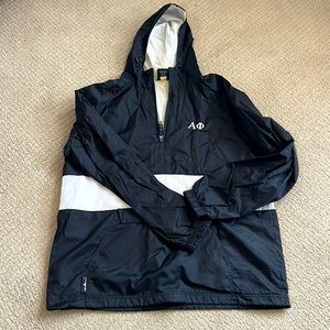 Worn only a couple of times black and white Alpha Phi rain 1/2 zip with pocket